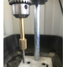 Diamond covered hollow drilling bit in the column drilling machine