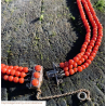 Oxblood Antique coral bead in a 3 strand necklace with vintage 9k rose gold clasp toped with 3 matched coral cabochons